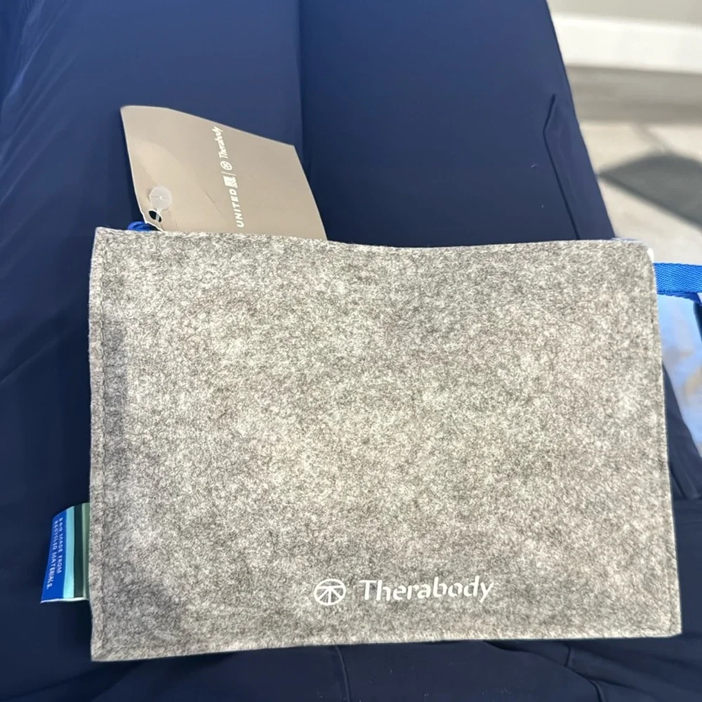 United Therabody new unused and unopened toiletry kit